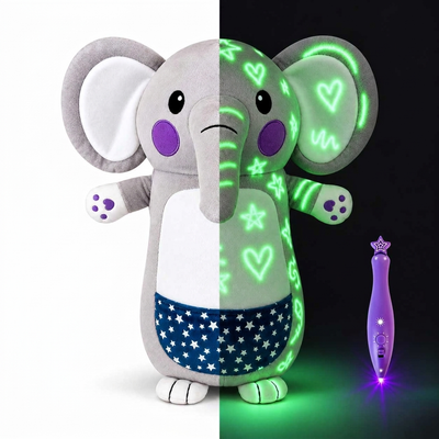 Glow-in-the-dark elephant plush, half in light and half glowing in the dark, with the light pen